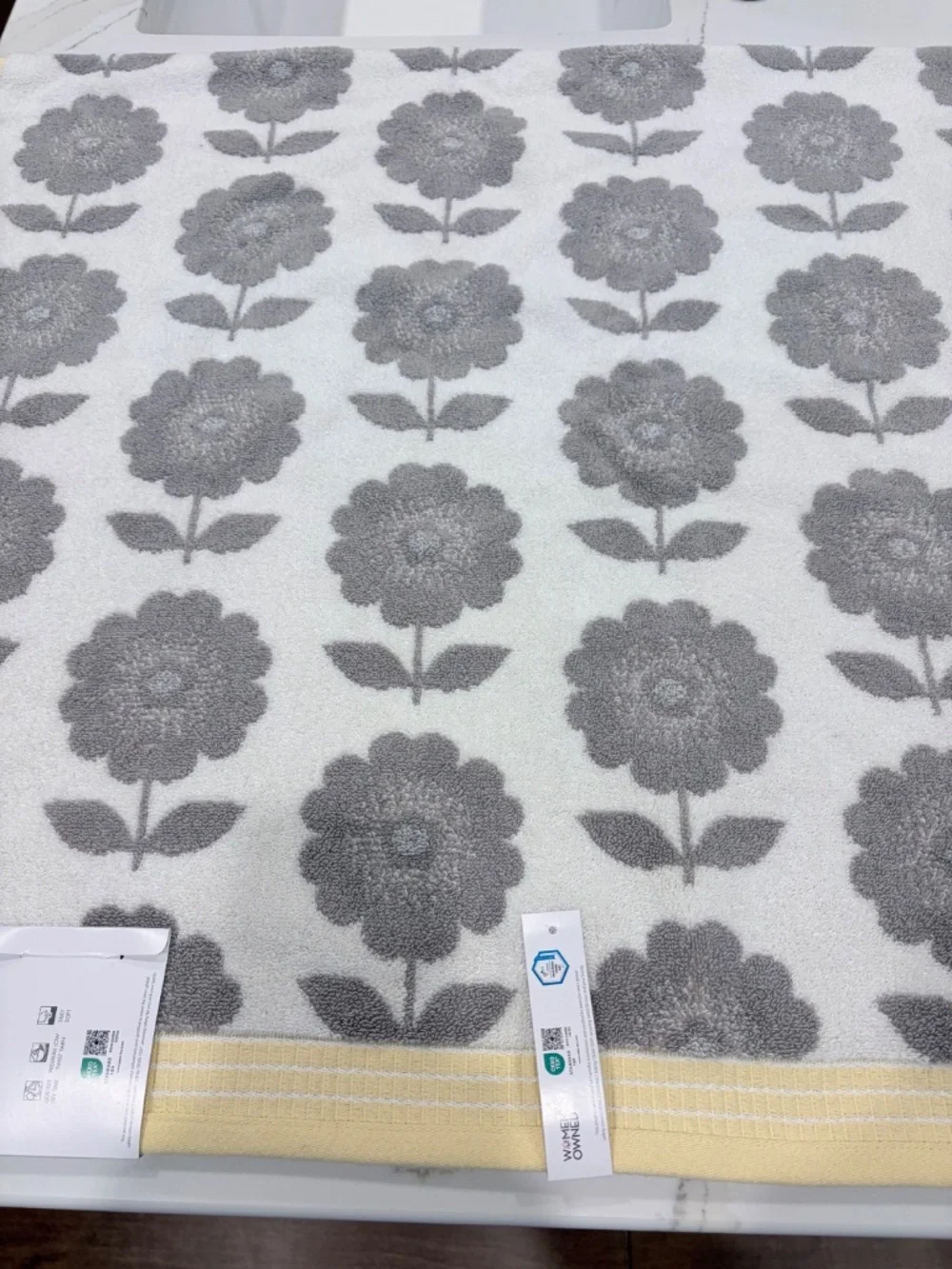 2 NWT Caro Bath Towels gray, yellow and white floral pattern